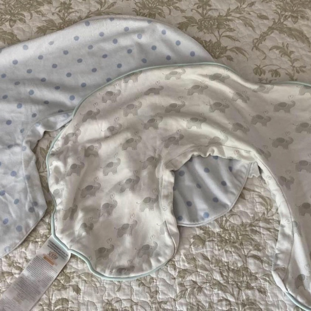 Two Boppy nursing pillow covers